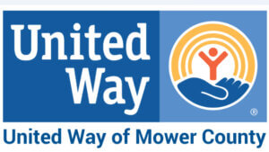 United Way of Mower County logo with a blue hand cradling an orange figure under a rainbow arc.