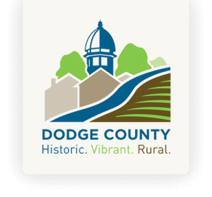 Logo with a dome, houses, hills, and a river; text reads Dodge County: Historic. Vibrant. Rural.