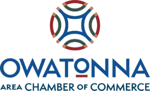 Owatonna Area Chamber of Commerce logo with a geometric circular design above the organization’s name.
