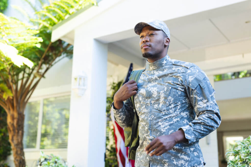 A man in military uniform, representing our commitment to veterans assistance and honoring those who serve.